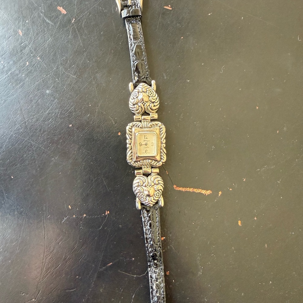 Black Leather Watch with Ornate Silver Details